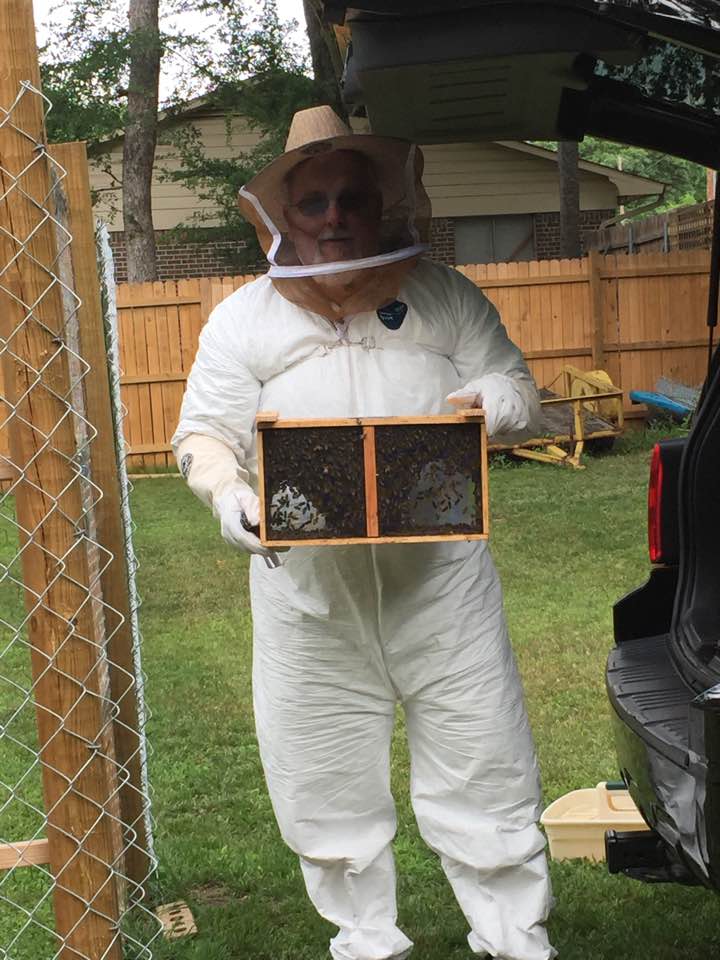 Ron in his bee suit and our first bee nuc 